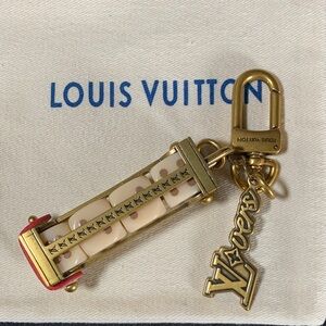 UNIQUE Upcycled Louis Vuitton Lover’s Dice bag charm